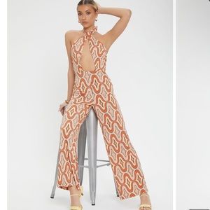 FOREVER 21 Geo print cut out jumpsuit medium NWT 😍